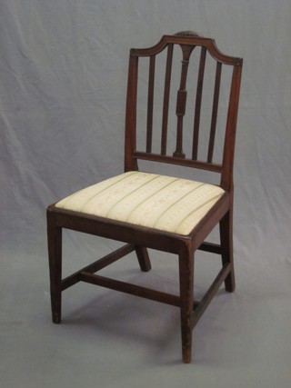 A Georgian mahogany stick and rail back dining chair