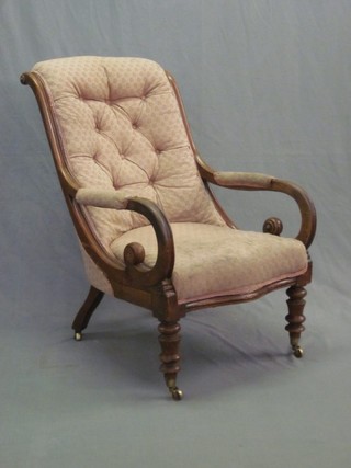 A William IV mahogany show frame open arm chair upholstered in pink material