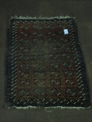 An Afghan rug 60" x 38" (worn)