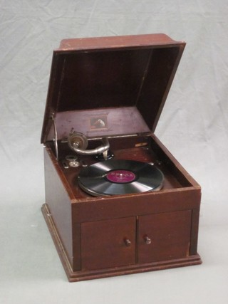 A His Masters gramophone contained in a mahogany case 
