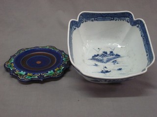 A circular Majolica dish 10" and an Oriental blue and white square bowl 10" (cracked)
