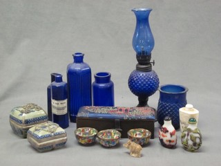 A collection of various Bristol Blue glass bottles and other decorative items etc