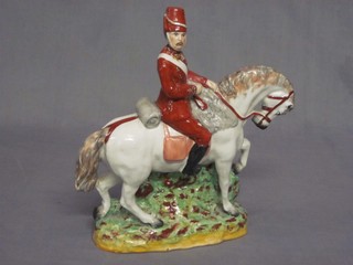 A 19th Century Staffordshire figure of a mounted Continental Cavalryman 10" (head f and r)