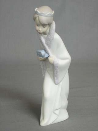A Lladro figure of a standing Prince, the base marked 1B, 8 1/2"