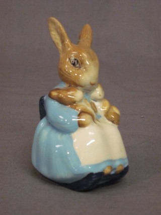 A Beswick Beatrix Potter figure - Mrs Rabbit and Bunnies 1876