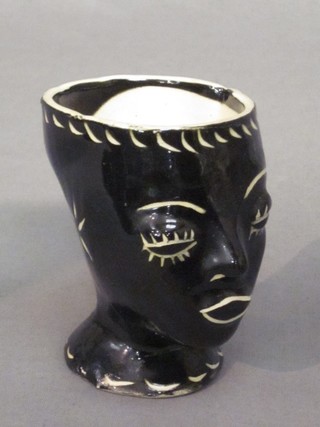 A humerous egg cup in the form of a portrait bust of a lady 4" the base marked Mousehole