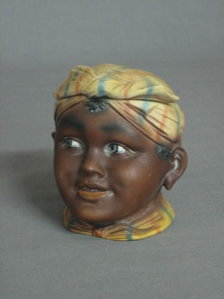 A 19th Century biscuit porcelain trinket box in the form of an Indian boys head 4"