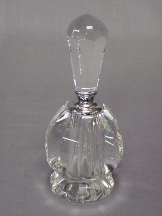 A circular faceted glass scent bottle and stopper 6" 