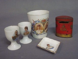 A Portsmouth City Edward VII Coronation beaker, 2 egg cups decorated Edward VII and Queen Alexandra, a Royal Doulton diamond shaped dish decorated portrait of Queen Alexandra 5" and a George VI oval Oxo money box