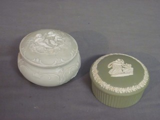 A circular green Wedgwood Jasperware jar and cover 3" and 1 other jar and cover