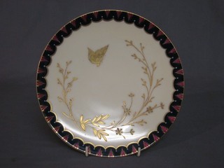 A 19th Century Continental circular porcelain plate decorated a butterfly, the reverse marked CFH 10"