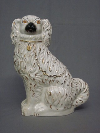 A 19th Century Staffordshire figure of a seated Spaniel 11" (heavily f and r)