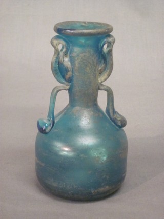 A Roman style blue glass twin handled club shaped vase 5"