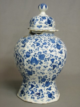 An 18th Century Delft blue and white octagonal urn and cover 14" (f)