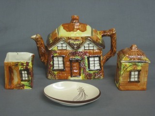 An Arthur Price cottage ware teapot, do. sugar bowl and cream jug, a Carltonware shaped dish and 4 Royal Copenhagen Christmas plates