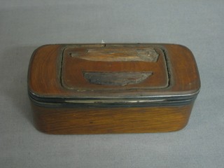 A 19th Century oval mahogany snuff box with hinged lid 4"