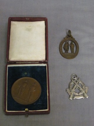 A silver shooting medal to Capt. R Morrison Birmingham 1932 and 2 bronze shooting medallions