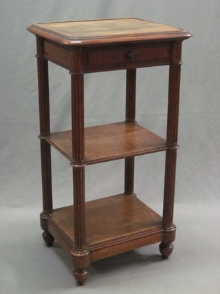 A 19th Century French oak 3 tier what-not fitted a drawer, raised on turned and fluted columns 18"