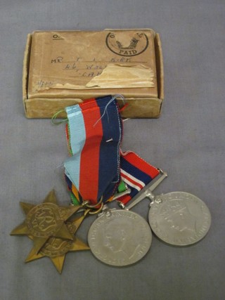 A group of 4 medals comprising 1939-45 Star, Burma Star, Defence & War medal