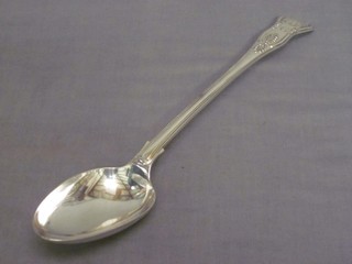 A silver plated Queens pattern serving spoon