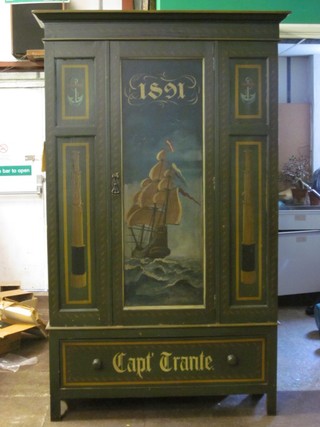 A green painted wardrobe with moulded cornice, the panelled door painted a sailing ship, the base fitted a drawer marked Captain Trant 49"