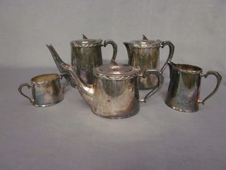 An Art Deco 5 piece silver plated tea/coffee service comprising teapot, coffee pot, hotwater, twin handled sugar bowl and cream jug by Embassy