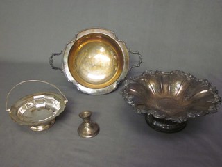 A silver plated twin handled dish and 2 other ornate silver plated dishes