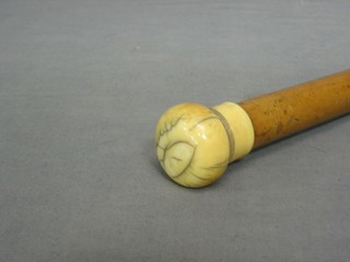 A 19th Century walking cane with turned ivory knob