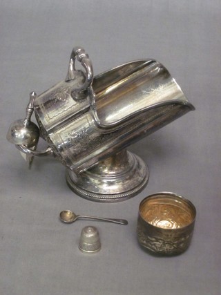 A Britannia metal sugar scuttle, a silver lid, a thimble and a condiment spoon