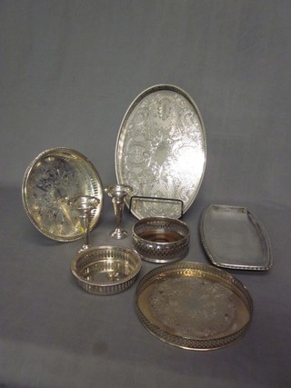2 silver plated bottle coasters, an oval silver plated tray, various trays etc