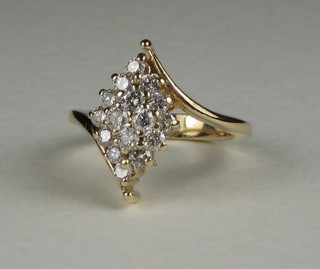 An 18ct yellow gold cluster dress ring set 16 diamonds,