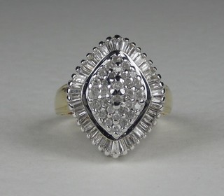 A lady's 18ct gold  marquise shaped dress ring set numerous diamonds
