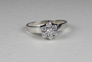 A 14ct white gold dress ring set diamonds