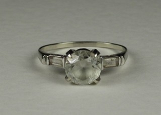 A lady's 14ct white gold dress ring set a white stone