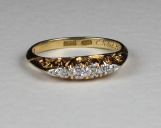 A lady's 18ct gold dress ring set diamonds