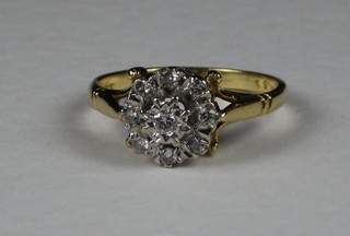 A lady's 18ct yellow gold cluster dress ring set diamonds