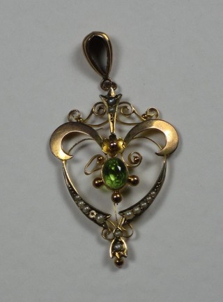 A 9ct gold pendant set a peridot and pearls