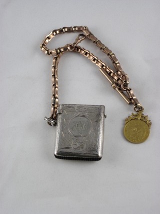 A hollow gold fancy link Albert hung an 1896 Cougar Pond and a silver vesta case