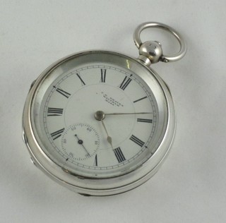 An open faced pocket by A M Watch Co. Waltham, contained in a silver case
