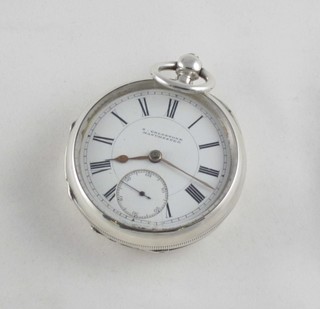 An open faced pocket watch by S Goldstone of Manchester contained in a silver case