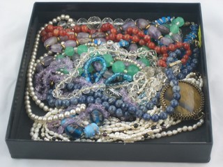 A collection of various costume jewellery necklaces etc