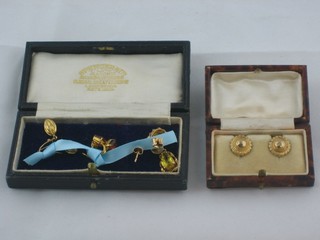 4 pairs of gold earrings