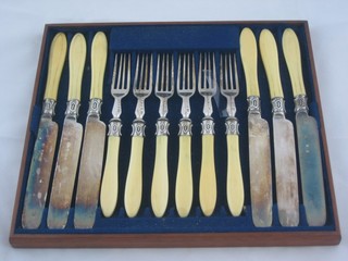 A set of 6 silver plated fruit knives with ivory handles