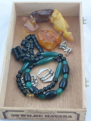 A small section of amber 1 1/2", an amber figure of 2 fish and 2 hardstone necklaces