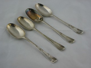 4 George I silver Old English and rat tail pattern pudding spoons, London 1723 3 ozs