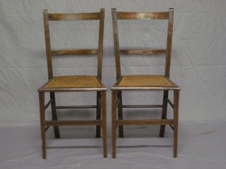 2 pairs of Edwardian inlaid mahogany dining chairs with woven rush seats