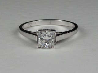 A lady's 18ct white gold engagement ring set a Princess cut diamond, approx 1.01ct