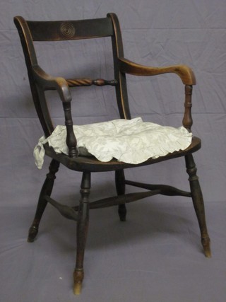 A 19th Century elm bar back carver chair with solid seat, raised on turned supports