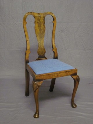 A 1930's Queen Anne style slat back bedroom chair with upholstered drop in seat, raised on cabriole supports