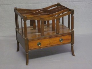 A Georgian style mahogany 4 division Canterbury with turned and reeded columns, the base fitted a drawer and raised on outswept supports 19"